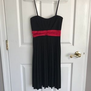 Black dress with red ribbon